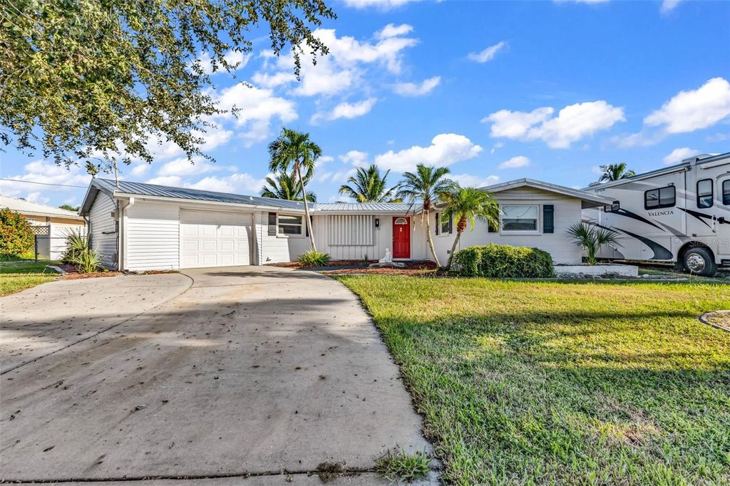 Photo of 138 Leland Street SE, Port Charlotte, FL 33952 (MLS # C7516259)