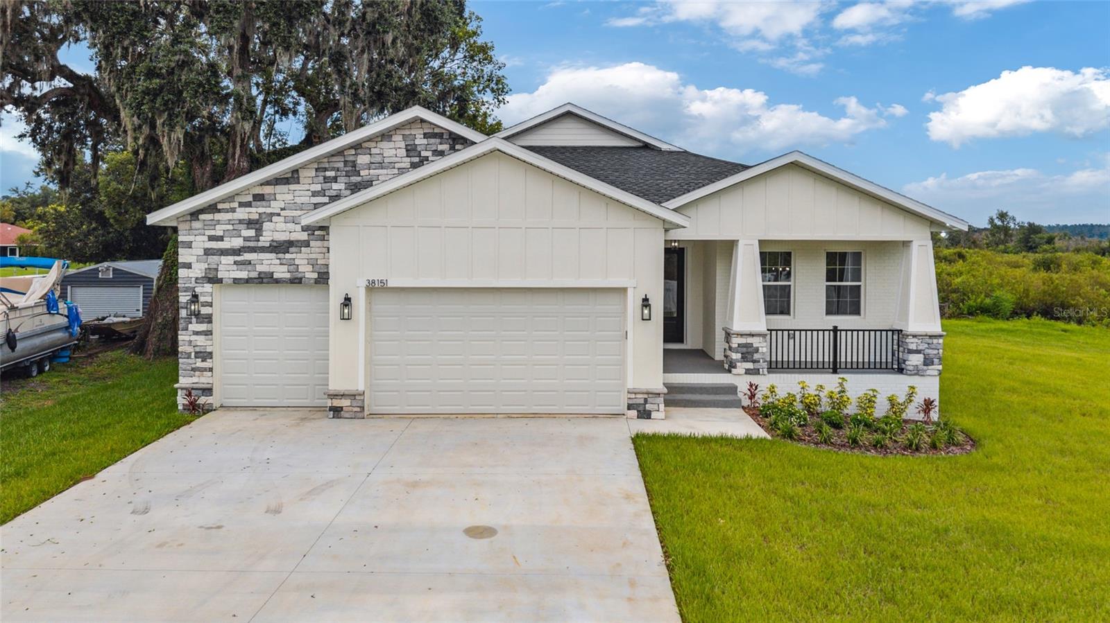 Welcome to this stunning new construction in the heart of Dade City. Tucked away at the end of a quiet street, this modern farmhouse offers 4 bedrooms, an office, 3 full baths, and 2,351 sq ft of thoughtfully designed living space and offers a spacious yard with room to play, garden, or relax—and no HOA restrictions. Enjoy an open-concept layout with luxury vinyl plank floors, high ceilings, and natural light throughout. The gourmet kitchen features quartz countertops, sleek soft-close cabinetry, an eat-in island, and a walk-in pantry with built-in shelving. The spacious primary suite includes a walk-in shower and a walk-in closet with custom built-ins. Enjoy peace and privacy with no through traffic, plus the convenience of being just minutes from downtown Dade City, shopping, dining, and great schools.
Bonus: This property also includes an additional .99-acre parcel (Parcel ID 35-24-21-0050-00L00-0051), offering extra space, privacy, or future potential—rare find in this area!
Don’t miss your chance to own this exceptional home—schedule your private showing today!