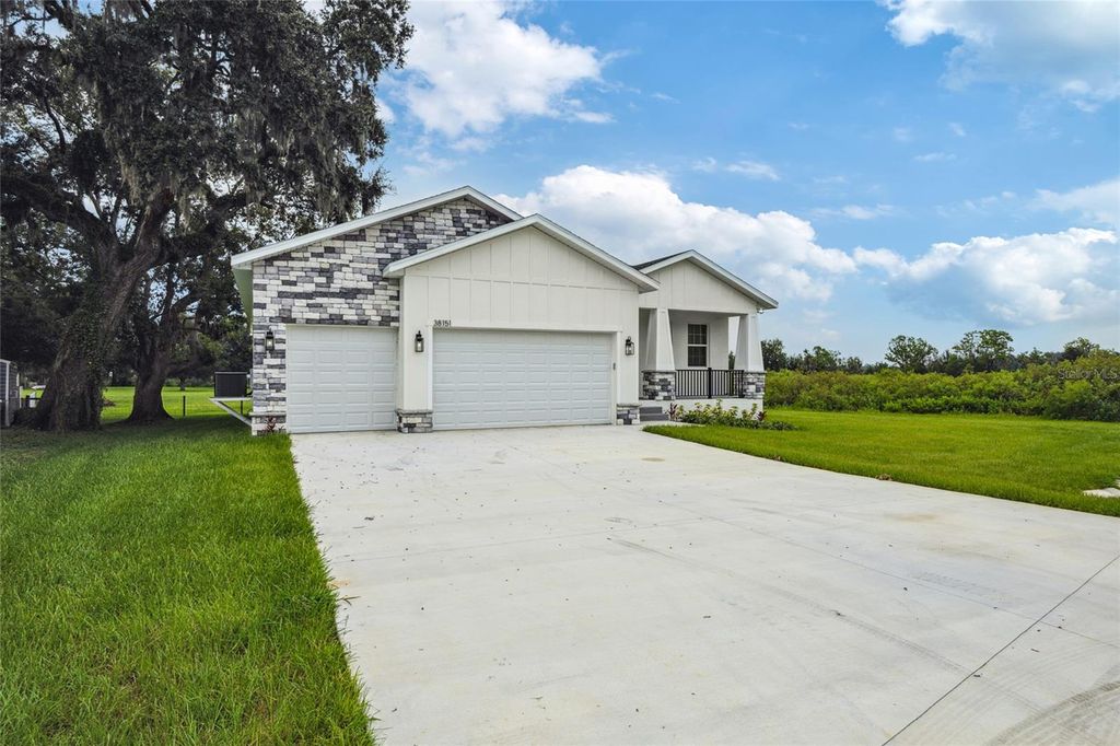 Photo of 38151 Sunset Avenue, Dade City, FL 33525 (MLS # TB8408064)