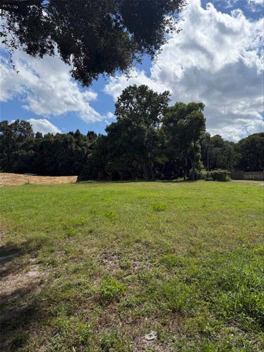 Bring your own builder! This beautiful corner lot is located in St Cloud city limits. Lot has been cleared and already has a dirt pad ready to build. A pole barn is located in the rear of the property and the back portion has a chain link fence surrounding it.  Your only minutes away from shopping, the Lake Nona Medical center, or the onramp of the turnpike that can take you to the Orlando International airport, theme parks, or to the beaches. This lot won't last long.