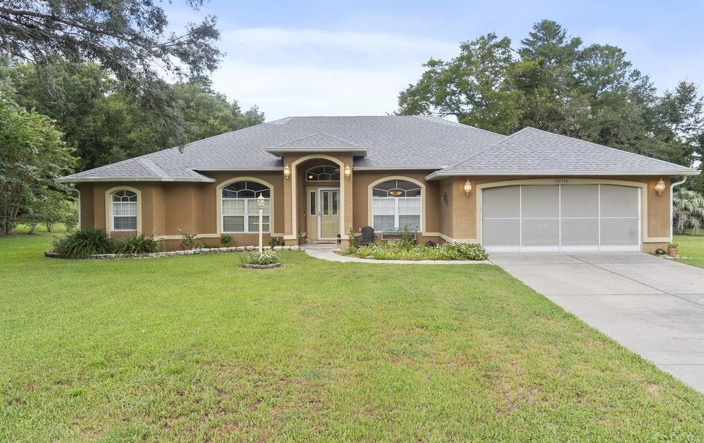 Photo of 10716 SW 53rd Circle, Ocala, FL 34476 (MLS # OM710536)