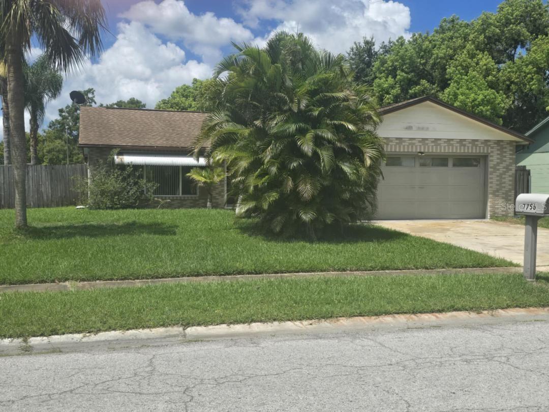 This charming Seven Springs home sits on a corner lot, has 2 newly carpeted bedrooms, 2 full bathrooms, a 2 car garage and beautiful mature landscaping!!! The main bedroom has an en suite bathroom and boasts a walk-in closet! The roof and AC were both replaced in 2018 and the water heater was replaced in 2020. The home is on Ivory Terrace and is easy walking distance to Seven Springs Elementary.