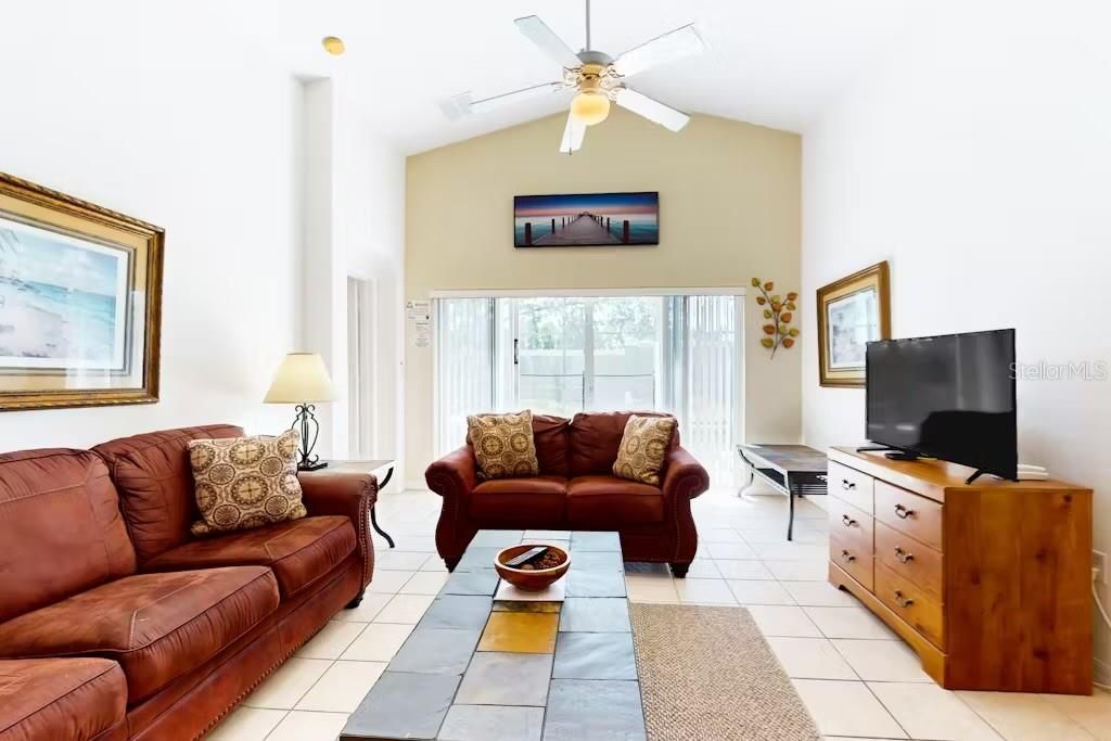 Photo of 366 Andalusia Loop, Davenport, FL 33837 (MLS # S5137282)