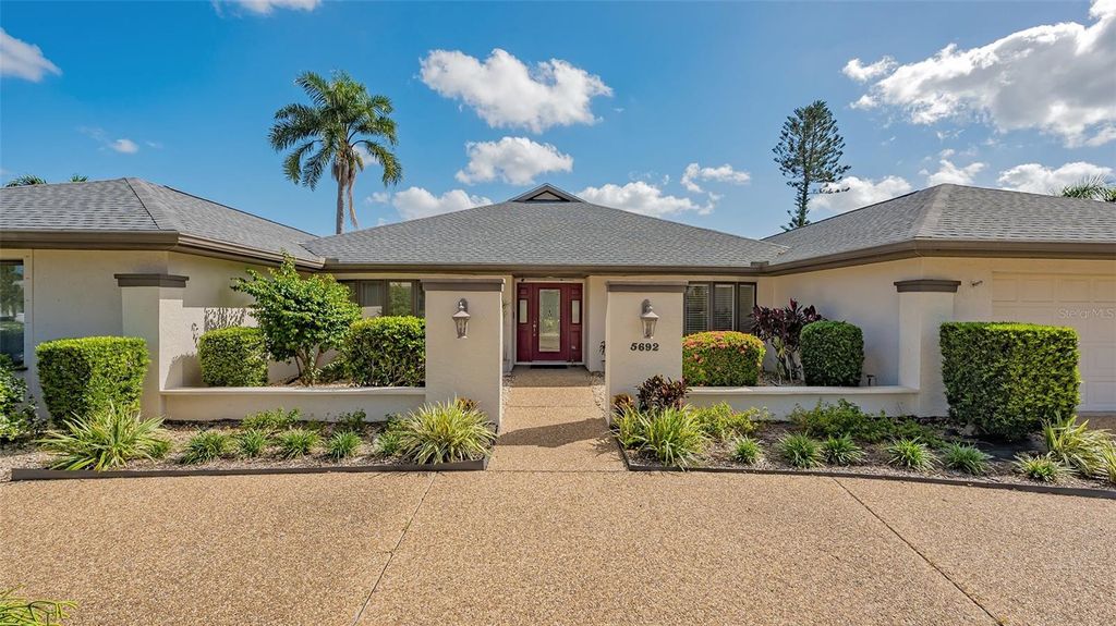 Photo of 5692 Country Lakes Drive, Sarasota, FL 34243 (MLS # A4669879)