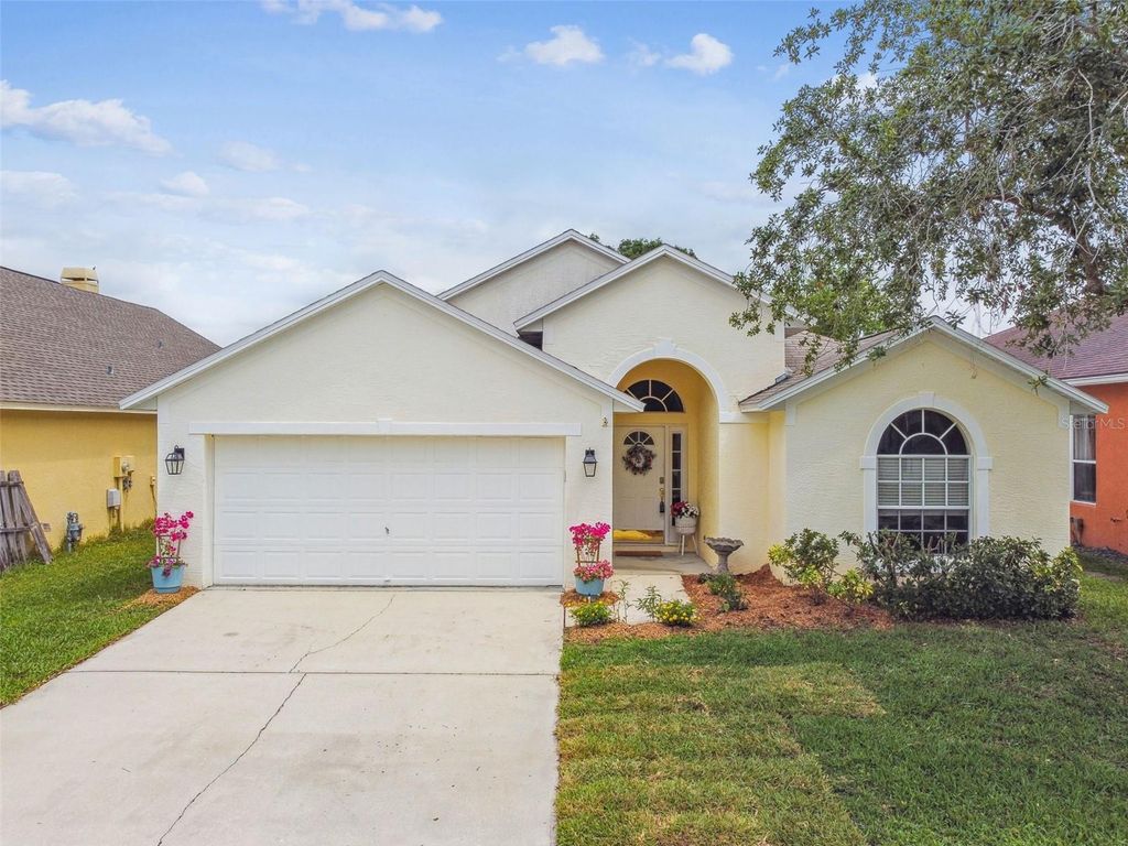 Photo of 1318 Crimson Clover Lane, Wesley Chapel, FL 33543 (MLS # TB8369024)