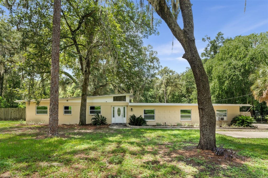 Photo of 10907 SW 24th Avenue, Gainesville, FL 32607 (MLS # GC541386)