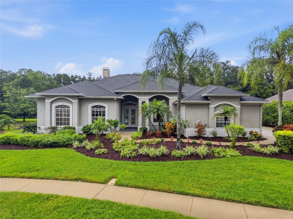 Photo of 4034 Executive Drive, Palm Harbor, FL 34685 (MLS # TB8554964)