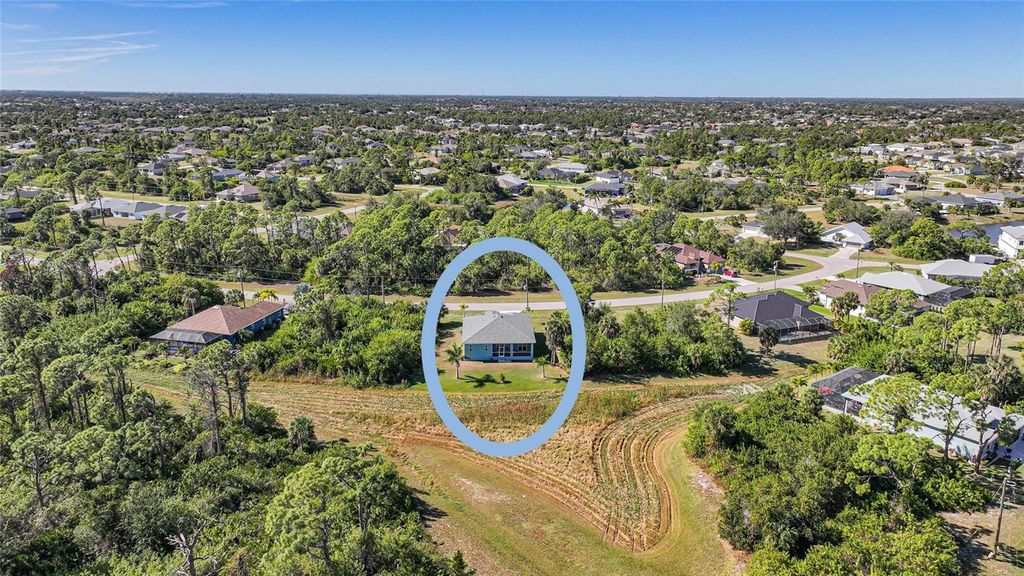 Photo of 131 Coca Lane, Rotonda West, FL 33947 (MLS # D6144963)