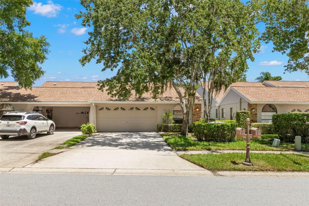Photo of 5511 Salem Square Drive N, Palm Harbor, FL 34685 (MLS # TB8411139)