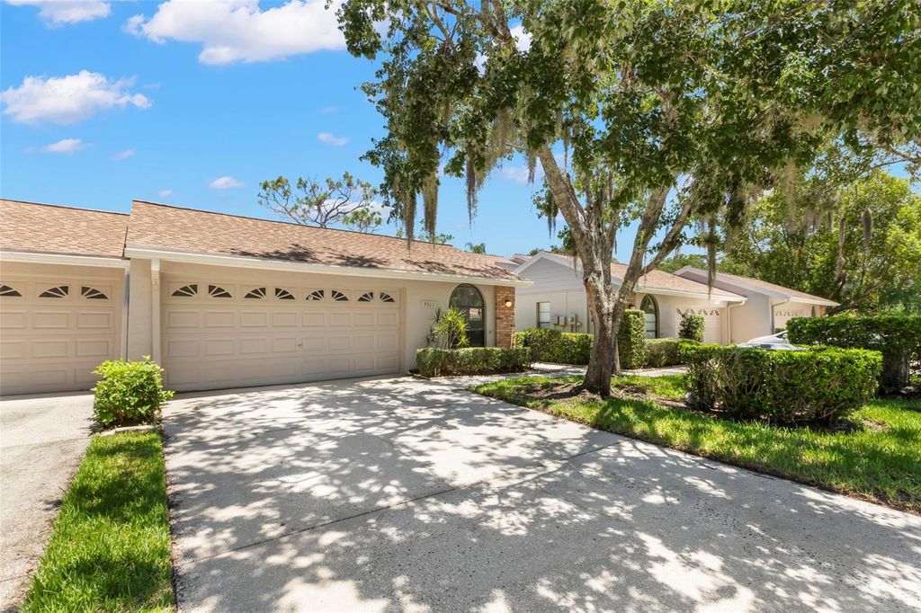Photo of 5511 Salem Square Drive N, Palm Harbor, FL 34685 (MLS # TB8411139)