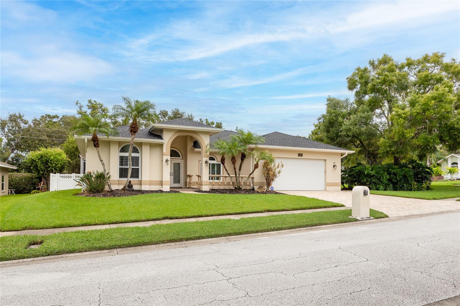 Discover your Florida dream home in sought-after Stirling Heights! Step into peace of mind and modern comfort with this beautifully maintained 3-bedroom, 2-bath executive home in Delightful Dunedin. Featuring a brand-new roof and water heater (2024) along with all-new hurricane-impact windows and doors (2024), this home is built for safety and energy efficiency—giving you confidence through every storm season.
From the moment you enter, you’ll appreciate the 10’ ceilings and natural light flooding the bright open living and dining area, accented with elegant crown molding. Pocketing sliding doors create a true indoor-outdoor experience, leading to your private screened pool and lanai—perfect for entertaining friends or enjoying a quiet sunset swim.
The split bedroom floor plan ensures privacy for all. The primary suite is a retreat of its own, with double French doors to the pool, two walk-in closets, and a spa-like en-suite bath featuring dual vanities, a walk-in shower, soaking tub, and private water closet.
The heart of this home—the expansive kitchen—is designed for both cooking and connection, boasting an oversized island with seating for six, stainless steel appliances, and a sunny dinette overlooking the pool. Just steps away, the spacious family room with a wood-burning fireplace offers the perfect spot to relax on cooler evenings and also has access directly to the pool/lanai.
Additional highlights include a separate inside laundry room with abundant built-in storage, plantation shutters throughout, and a gorgeous paver driveway with a spacious front patio and courtyard that add curb appeal and outdoor living space.
Enjoy golf cart access to vibrant downtown Dunedin with its boutique shops, restaurants, and year-round events. You’re minutes from pristine Gulf beaches, the restored Donald Ross–designed Dunedin Golf Course, and community favorites like the Fine Art Center, Hammock Park, and Highlander Park. Outdoor enthusiasts will appreciate nearby access to the Pinellas Trail for miles of biking and walking adventures.
Located in a non-evacuation area and Flood Zone X, lenders do not require flood insurance. Plus, this home sustained no damage from recent storms Helene and Milton in 2024. Don’t wait—homes like this in Stirling Heights don’t come along often! Schedule your private showing today and experience the perfect blend of safety, style, and Dunedin charm.