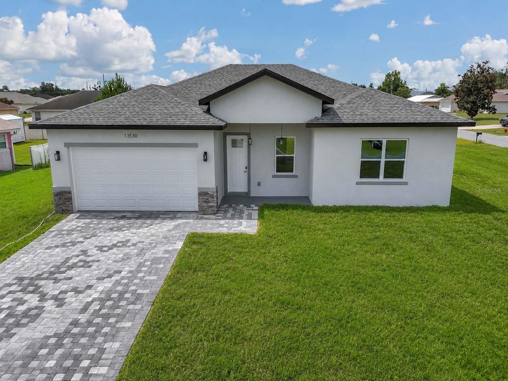 Photo of 13530 SW 47th Circle, Ocala, FL 34473 (MLS # TB8525872)