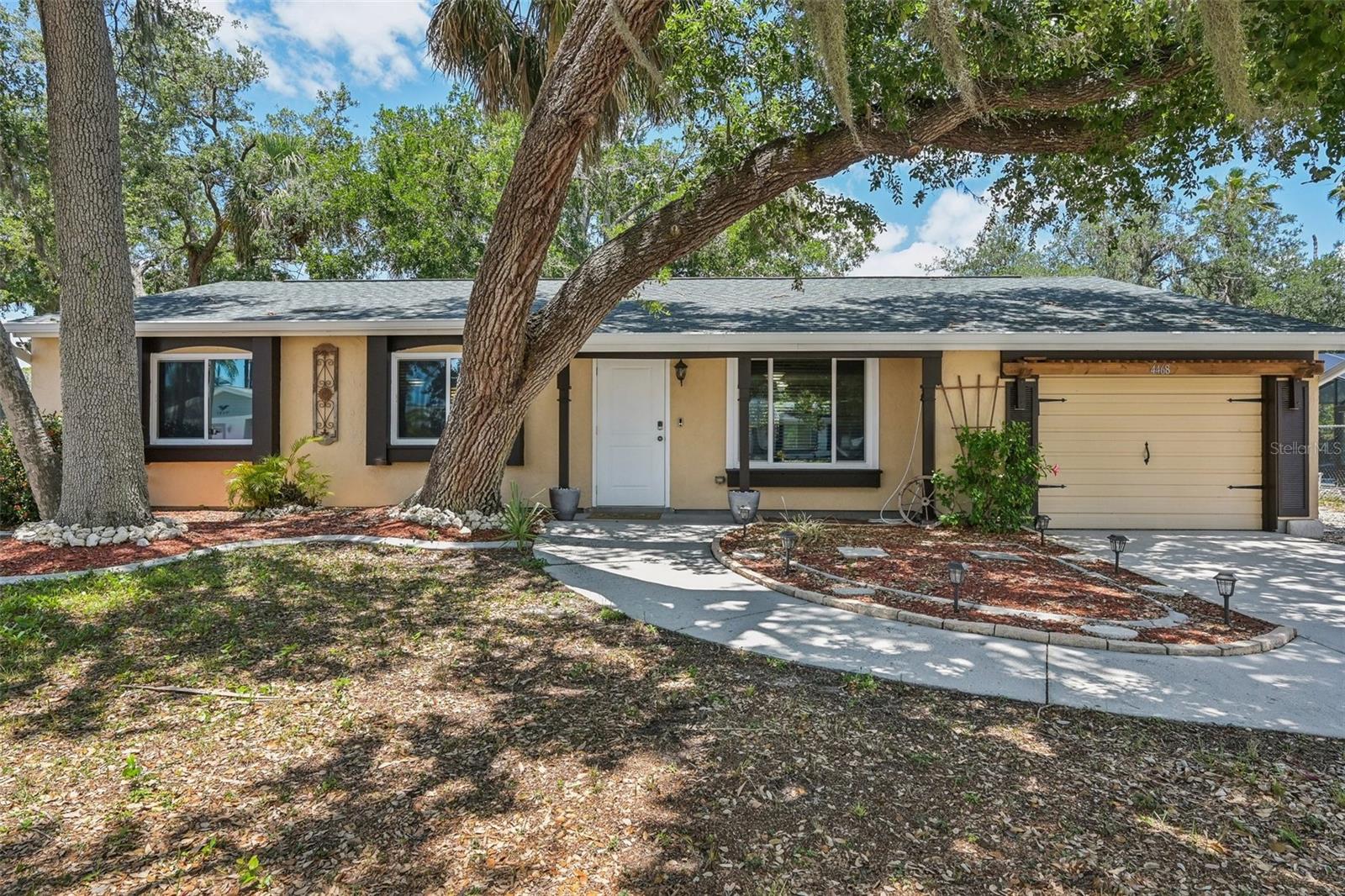 Welcome to 4468 Maraldo Ave, a beautifully renovated 3-bedroom, 2-bath home located in a peaceful, non-HOA neighborhood in one of Southwest Florida’s fastest-growing cities. NOW offering a $5,000 credit to the buyer for closing costs or rate buy down! Step inside and immediately notice the fresh interior and exterior paint, modern finishes, and open living spaces filled with natural light. The kitchen features some brand-new stainless steel appliances, quartz island and countertops. Enjoy peace of mind with major system updates already completed: New Roof (2023), HVAC (2021), Upgraded Electric Panel (2016), Hybrid Heat Pump Water Heater, New Gutters, Hurricane Impact Windows and Front Door (2024). Additional comfort and tech features include a whole-house air purification system, smart door lock, video doorbell, and a complete security system—bringing safety and convenience to everyday living.
The split-bedroom floor plan provides privacy, with bedrooms and updated bathrooms. Garage includes both window unit A/C and cooling heat pump water heater for great working and workshop conditions during the warmer months. Outside, the property offers room to enjoy the Florida lifestyle—whether you’re relaxing under the sun or adding your personal landscaping touches. Located just minutes from shopping and dining at the Village Shops, outdoor fun at the North Port Aquatic Center, and the vibrant new Wellen Park development. You’re also close to local golf courses, Warm Mineral Springs, and a short drive to some of Florida’s best Gulf Coast beaches, like Venice and Manasota Key. With easy access to I-75 and US-41, commuting to Sarasota, Fort Myers, is a breeze. Don’t miss the opportunity to own this turn-key, low-maintenance home in a highly desirable location. Schedule your private showing today and make this your next Florida home!