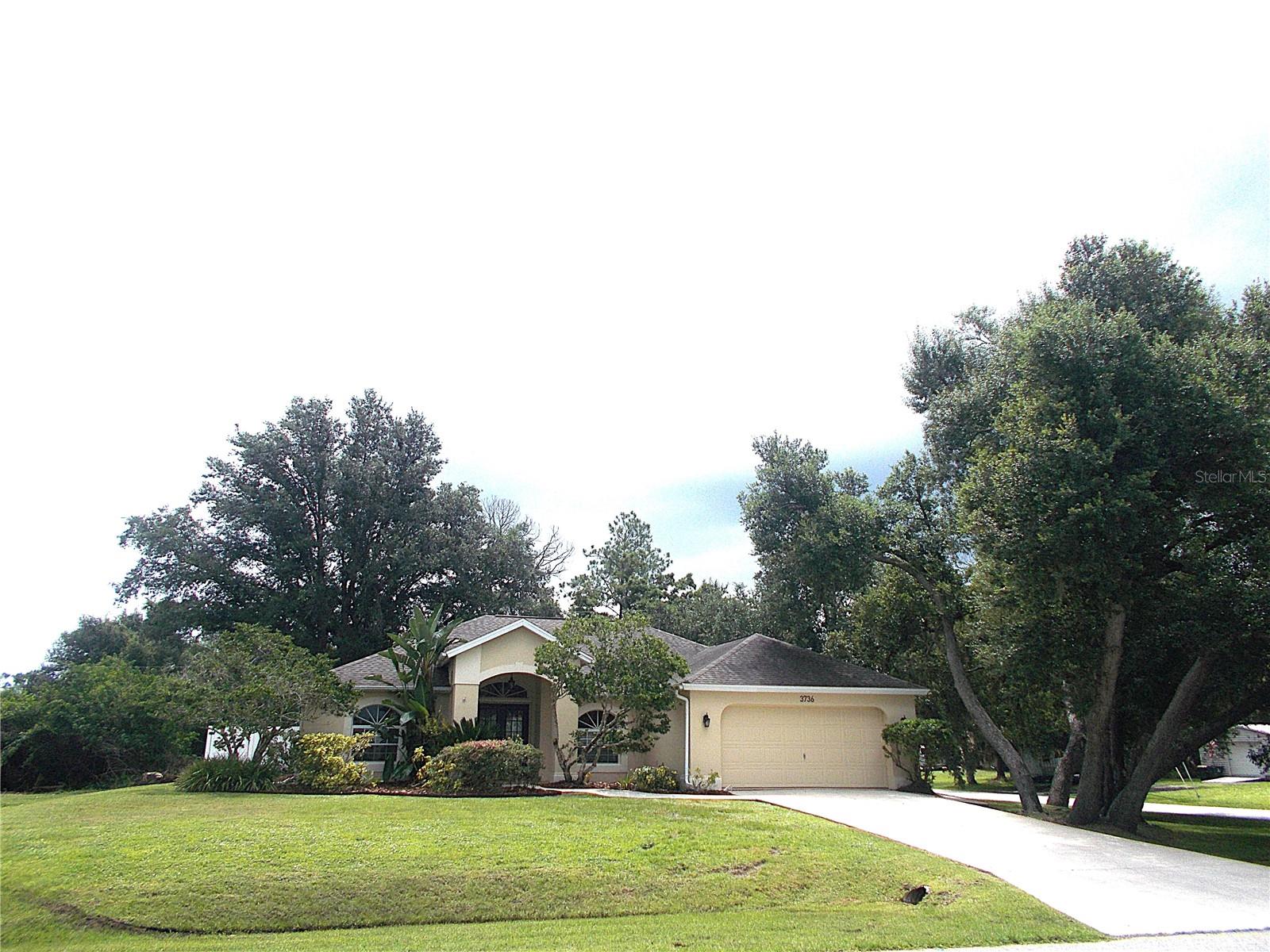 This fabulous one-owner home is on the market for the very first time and you've found it! The perfect home to raise your family, for entertaining or to just thoroughly enjoy living in Paradise! This 3 bedroom, 2 bath, 2 car garage pool home sits on a corner lot with an additional adjacent cleared lot included!! Talk about the ultimate in "elbow room!" The gorgeous double-door entryway will lead you into a neutral palate and your eyes will immediately go straight to the fabulous "disappearing" sliding glass doors out to the marvelous pool area. Just picture yourself unwinding after a hectic day lounging in the pool surrounded in privacy by your vinyl fenced backyard and beautiful landscaping or perhaps you're hosting the yearly BBQ with the volleyball net set up in the vacant lot next door - the possibilities are endless! Inside, you'll enjoy a split-bedroom floor plan, large living room, separate dining area, breakfast nook off the kitchen and an inside laundry room. The primary suite offers an updated ensuite bathroom with dual sinks and a beautiful stone walk-in shower. Roof was replaced in 2018, the entire home was re-plumbed and yes, you will enjoy City water!! And just when you thought it couldn't get any better. . . . the location of this home is really hard to beat! Just 1 mile from I-75 and the brand new Sarasota Memorial Hospital North Port campus (to be built), 1 mile to North Port's City Center and 3 miles to US 41. Grocery shopping and numerous restaurants are just down the street. I've heard it said many times that this is the most popular neighborhood in all of North Port due to its location, but you'll see for yourself! Don't let this incredible property and opportunity get away! Make your showing appointment right away and make this property yours. . . . . before someone else does!