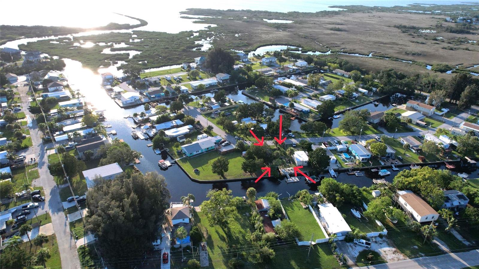 Waterfront lot in desired, quiet non-deed restricted golf cart community with great potential to build your dream waterfront home on.
Bring your imagination and your boats and water-toys and this could be yours.