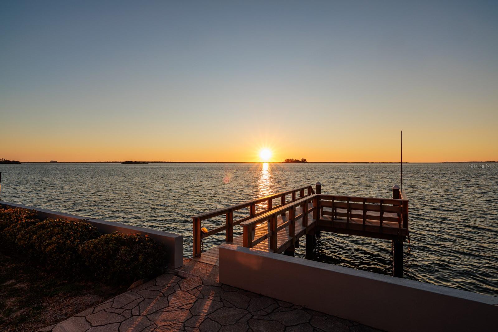 An incredible opportunity awaits on one of Dunedin’s most stunning open waterfront lots in Harbor View Villas. This property, offered at land value, invites you to design and build the home of your dreams. With 77 feet of direct intracoastal frontage, it boasts uninterrupted western views of Caladesi and Honeymoon Islands, the Dunedin Causeway and Dunedin Bridge, and southwest views to Clearwater. Imagine the breathtaking sunsets that fill the sky nearly every evening. The property features a new dock installed in 2024 that withstood both hurricanes well. The property is ideally on Harbor View Drive along a cul-de-sac at the end of this beautiful street. In Harbor View Villas, a welcoming, golf cart-friendly community, you’ll be just a short drive from the newly renovated Dunedin Golf Club, originally designed by Donald Ross and once home of the PGA. This prime location also offers easy access to the Dunedin Causeway, Honeymoon Island State Park, Pinellas Trail and is only a few miles from charming downtown Dunedin. Serious cash buyers only, with proof of funds required before showings.