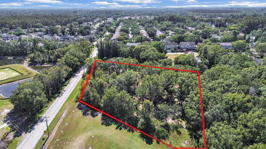 Photo of 16906 Lakeshore Road, Lutz, FL 33558 (MLS # TB8450301)