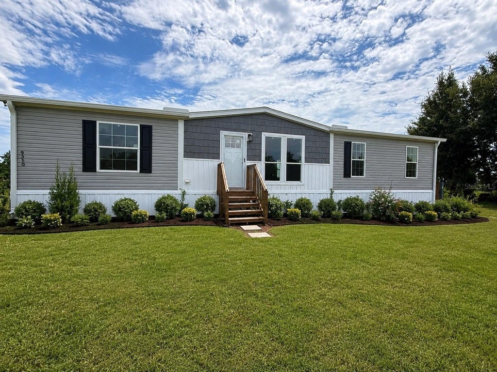 Photo of 9310 Lakeshore Drive, Clermont, FL 34711 (MLS # O6439144)
