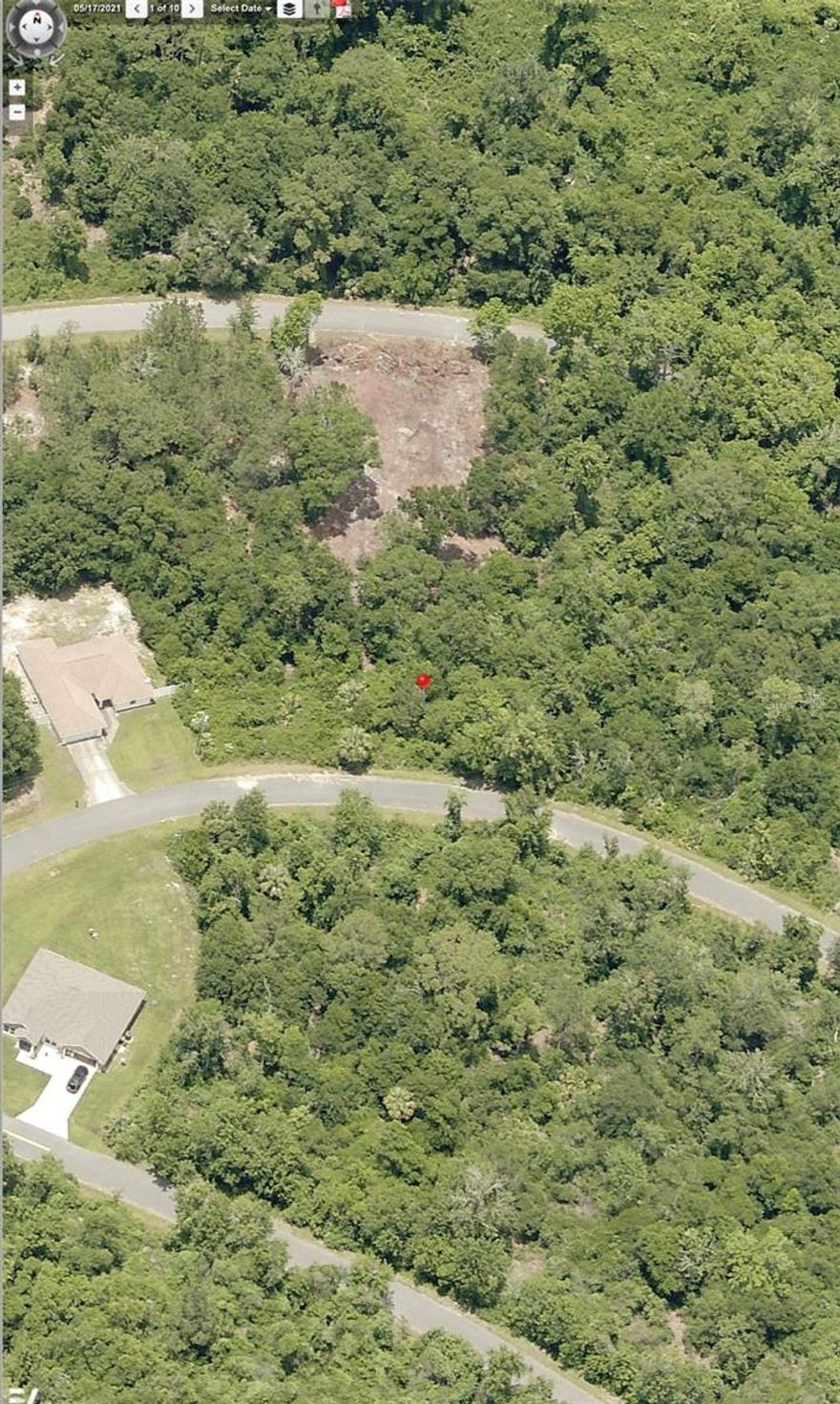 Great lot on a paved road in Silver Spring Shores. Lot is wooded nearest home is 2 lots to the left. For driving instructions put in address of 212 Emerald Loop Way, Ocala, FL as this is nearest home. Lot is two lots to the right of this address. Trustee is a Florida licensed real estate agent.