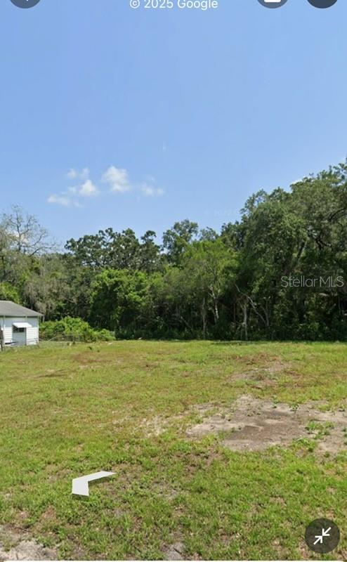 This vacant lot for sale in Citrus Pointe Area neighborhood is almost a half acre and conveniently located near the Westfield Citrus Park shopping center. Great opportunity to build your dream home with your builders. Electricity is available for this site. Go ahead and take your pick of builders and start designing your next home today! Lot is mainly cleared with some mature trees on the perimeter. Located on a quiet, dead-end street. No front or back neighbors!