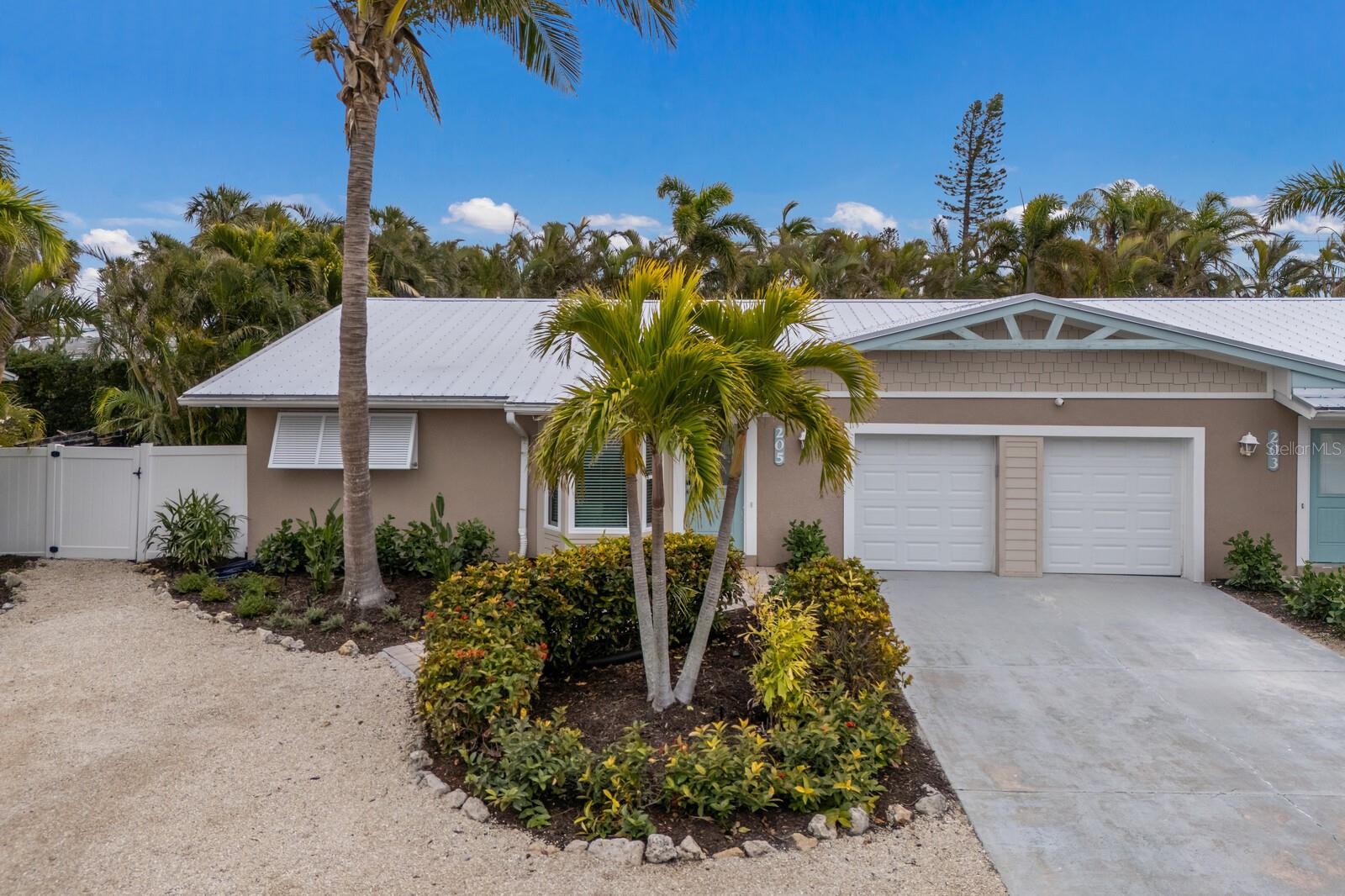 NEW PRICE! Your Anna Maria Island dream awaits at Cozy Cabana East! This stylishly newly renovated 2BR/2BA condo offers the perfect blend of coastal comfort and modern luxury. Step inside and be greeted by professionally designed interiors showcasing brand-new stainless-steel appliances, stunning stone counters, and stylish furnishings (sold turnkey). Recent updates include luxury vinyl plank flooring throughout, a new AC and water heater (2024), a 2021 metal roof, and impact windows and doors for peace of mind. Outside, your private oasis awaits with a heated saltwater pool, professionally turfed yard, alfresco dining, and 2 outdoor showers w/ hot and cold water - perfect for relaxing after a day at the beach. Just a short stroll or bike ride to the pristine Gulf beaches, local shops, and restaurants, this property is ideal for vacation getaways and/or a smart investment. With excellent rental income and future bookings already in place, this gem is an ideal blend of personal enjoyment and investment potential! Start living your Anna Maria Island dream today!