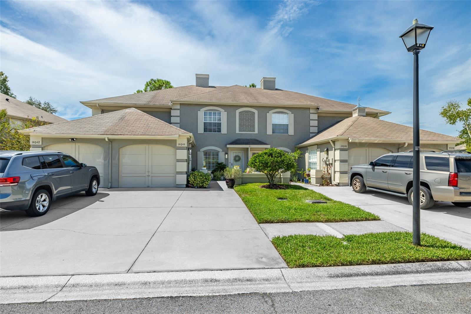 Welcome to this beautifully updated townhouse nestled in the highly sought-after Chardonnay subdivision of Carrollwood Village. This spacious 2-bedroom, 2.5-bath home offers 1,468 square feet of thoughtfully designed living space, blending modern updates with the charm of low- maintenance living in one of Carrollwood's most desirable neighborhoods.
The main level features an open-concept living and dining area that seamlessly connects to a stylish, renovated kitchen. Outfitted with stainless steel appliances and granite countertops, this kitchen is ideal for entertaining or enjoying everyday meals in comfort and style.
Towards the back of the home, you'll find a cozy family room that opens onto a private outdoor patio. Beyond the patio lies a peaceful grassy common area shaded by mature trees, a perfect retreat after a long day.
Upstairs, two generously sized bedrooms offer comfort and versatility. The primary suite includes a large walk-in closet, an en-suite bathroom with a separate dressing vanity, ample natural light, ceiling fan, and brand-new carpeting throughout the entire second floor. The second bedroom also boasts a full en-suite bath and large closet, ideal for guests, a home office, or both. A conveniently located laundry room sits between the bedrooms for easy access.
Additional features include a one-car garage with brand-new epoxy flooring and a two-car driveway.
The community HOA fee is under $200 per month and includes access to a resort-style pool, weekly lawn care and landscaping, annual pressure washing of driveways and sidewalks, and exterior repainting every five years. The home has remained untouched by flooding or storm damage, even through recent hurricanes.
Living in Carrollwood Village offers access to multiple parks, tennis, basketball, and pickleball courts, as well as walking and biking trails. The
nearby community park includes outdoor fitness stations, dog parks, a skate area, and a splash pad with a playground for all ages. Residents also enjoy proximity to Carrollwood Golf Course and the new Carrollwood Cultural Center, which hosts a variety of classes and community events.
Prime location Just minutes frorn A-rated schools, Target, shopping center, restaurants, Starbucks, the YMCA, Veteran’s Expressway, and more.
Don't miss your chance to call this exceptional home yours, schedule a private showing today!