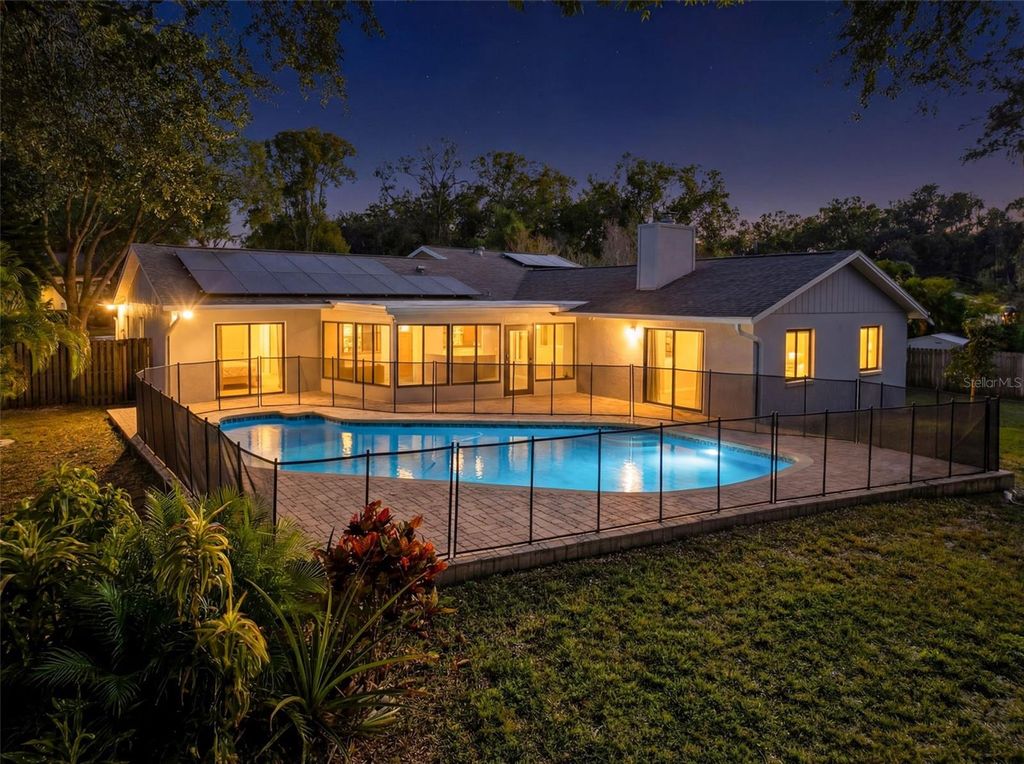 Photo of 915 Woodleaf Way, Tampa, FL 33613 (MLS # O6376478)