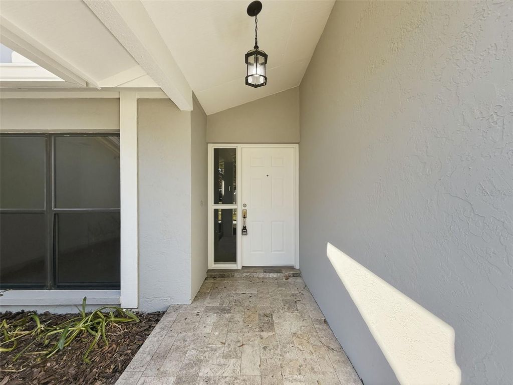 Photo of 915 Woodleaf Way, Tampa, FL 33613 (MLS # O6376478)