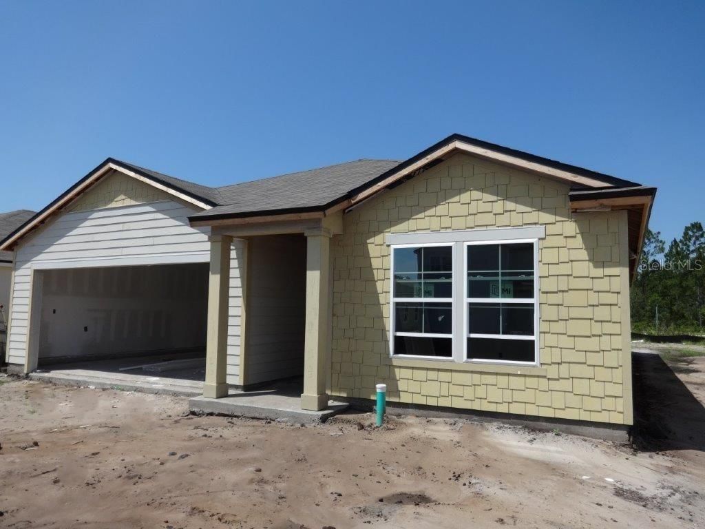 Photo of 29 SUMMERWOOD ROAD S, PALM COAST, FL 32137 (MLS # FC291633)