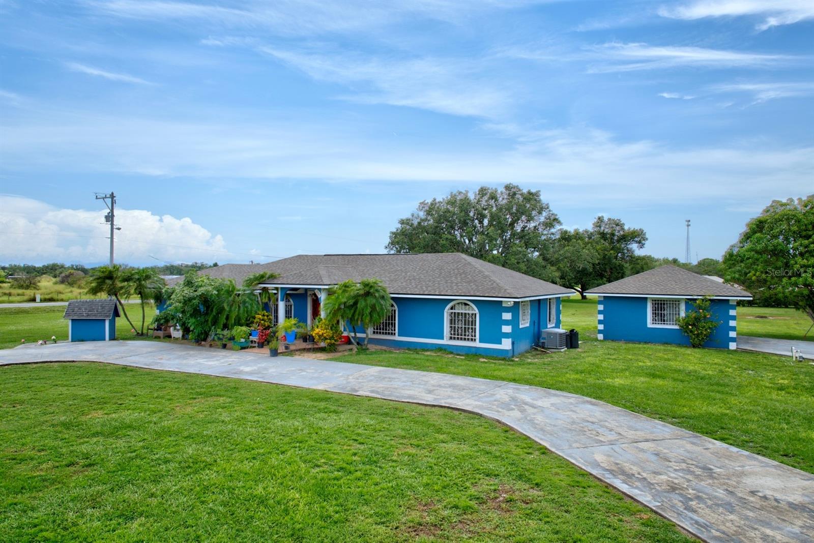 Discover the perfect blend of space, comfort, and privacy in this charming 4-bedroom, 2-bath ranch-style home nestled on a generous 2-acre lot. Featuring tile flooring throughout for easy maintenance, this single-story home offers a functional layout ideal for families or anyone seeking room to spread out. The property also includes a detached garage—perfect for additional storage, a workshop, or parking. Located in a quiet Wauchula subdivision, this home provides a serene, country-like setting while still being close to town conveniences. Don’t miss your opportunity to own a spacious retreat in a desirable location!