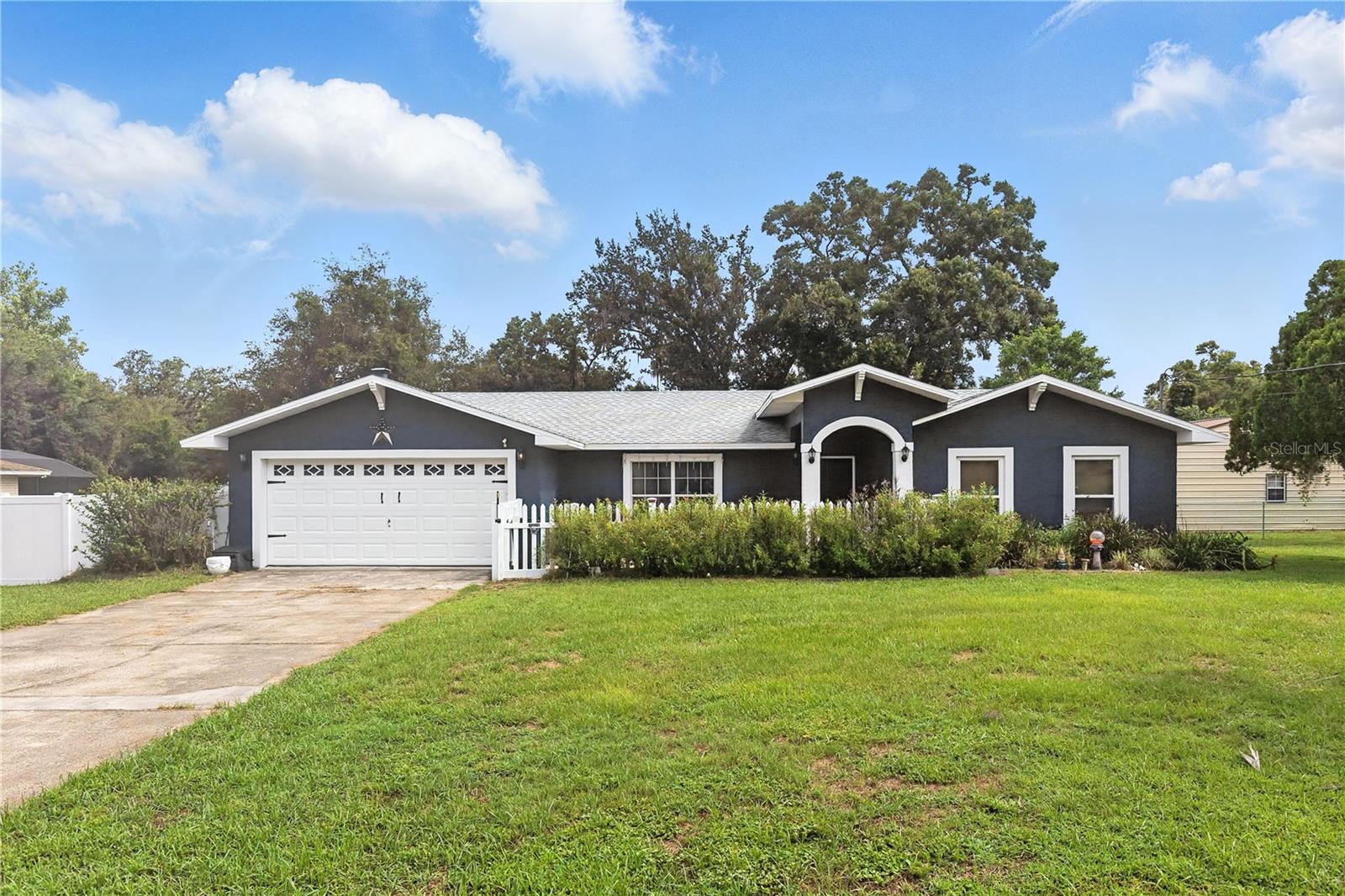 LOOKING FOR SPACE??? Check out this Pool Paradise in the highly sought after Hickory Hills community of Dade City with no HOA or CDD fees. This gorgeous contemporary style POOL home blends rustic charm with modern upgrades, offering the perfect setting for family living and entertaining. 4 Spacious Bedrooms, 3 Full Bathrooms, Two Master Suites, Two Living Rooms, Open Kitchen with Stainless Steel Appliances, Brick Fireplace, Custom Built Bar leading out to pool patio, Attached 2 car Garage, all in a split floor plan.
Step through sliding glass doors from the master suite or game rooms to your private pool oasis, perfect for Florida evenings under the stars.
The home sits on a generous 0.42-acre lot, offering space and privacy while still being close to hospitals, schools, shopping, and dining.
Whether you're hosting pool parties, relaxing by the fireplace, or tinkering in your detached garage workshop, this home has it all. And plenty of updates including new screens on pool cage, tankless water heater, new flooring, and more....
If you're looking for space and accommodations for a large family, this one is for you.
