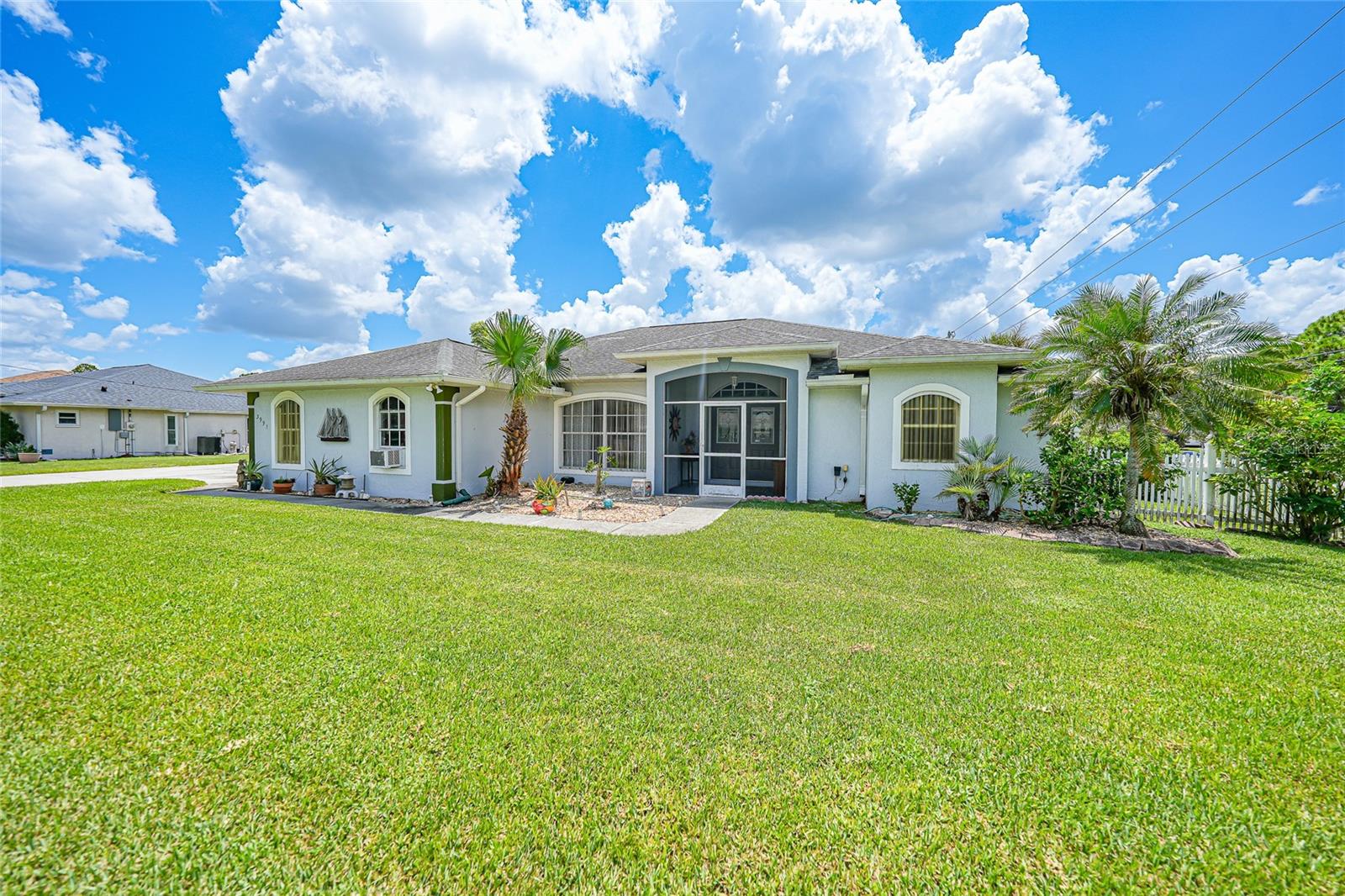 Welcome to your dream home! This stunning 3-bedroom, 2-bathroom pool home offers 1,842 square feet of thoughtfully designed living space, perfectly situated on an oversized lot with no flood zone—a rare find in today’s market. From the moment you step inside, you’ll be captivated by the open floor plan, flooded with natural light, and featuring beautiful, low-maintenance flooring throughout—no carpet in sight! The heart of the home is the spacious living area, seamlessly flowing into a modern kitchen that’s perfect for entertaining or everyday living. Step outside to your covered lanai and sparkling private pool, ideal for relaxing afternoons, weekend gatherings, or enjoying Florida’s year-round sunshine in total privacy. With three generous bedrooms, including a serene primary suite, and two full bathrooms, this home combines comfort and functionality effortlessly. The oversized lot provides ample space for outdoor activities, gardening, or future expansions. Every detail of this home has been thoughtfully designed to create a sense of luxury, ease, and modern living. Don’t miss this rare opportunity to own a pool home that truly has it all: space, style, privacy, and a location that offers peace of mind with no flood concerns. Your perfect Florida lifestyle starts here!