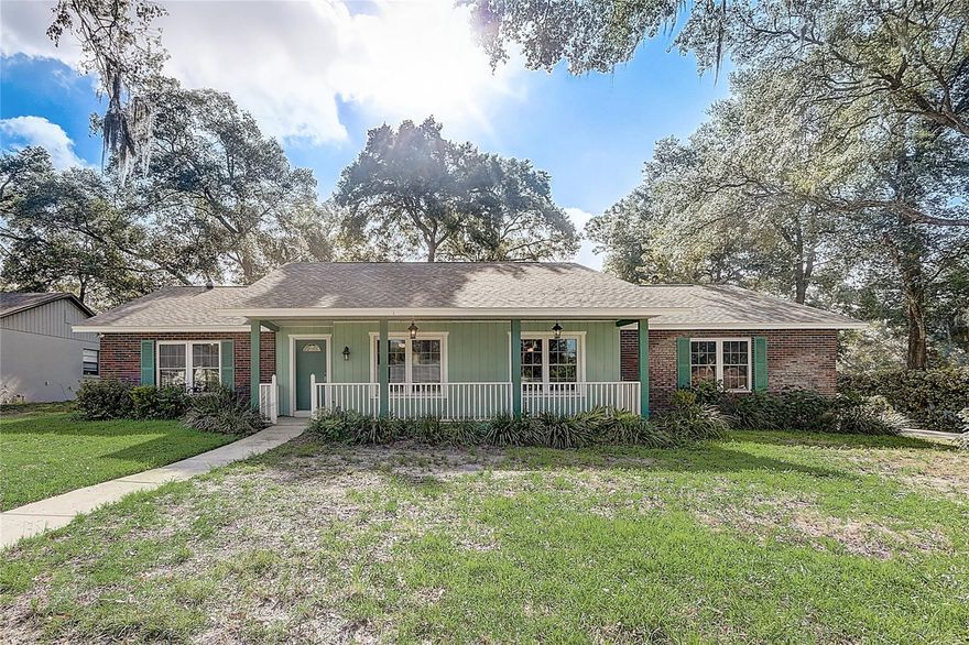 2022 ROOF! 2017 A/C!! 2023 Water Heater!!! This pool home offers 3 bedrooms and 2 bathrooms set in a split plan arrangement with spacious gathering areas showcased in between. There are formal living & dining rooms with hardwood floors, and a large family room that features a wood-burning fireplace, overhead projector with 120” retractable screen, and 4-panel sliding glass doors facing the pool. This home underwent extensive renovations in 2010. A few updates of note include knockdown ceilings, double pane windows, and a mini split in the primary suite for custom sleeping temperatures. There is an interior laundry room, and the side loading 2-car garage is oversized with a plastic flooring system for easy cleanup. Outdoors, a long covered front porch is the ideal place to greet visitors, while the fully fenced backyard offers a screened porch with ceiling fans and wet bar, all facing the pool for Florida living. This property is approximately 3.5 miles to Lake Apopka Wildlife Trail and approx 5 miles to Wekiwa Springs State Park. Choose your adventure! Come meet your new home!