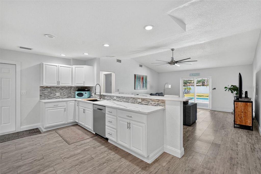 Photo of 3267 Fox Hill Drive, Clearwater, FL 33761 (MLS # TB8429202)