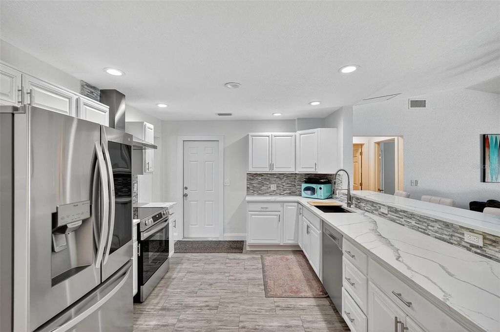 Photo of 3267 Fox Hill Drive, Clearwater, FL 33761 (MLS # TB8429202)