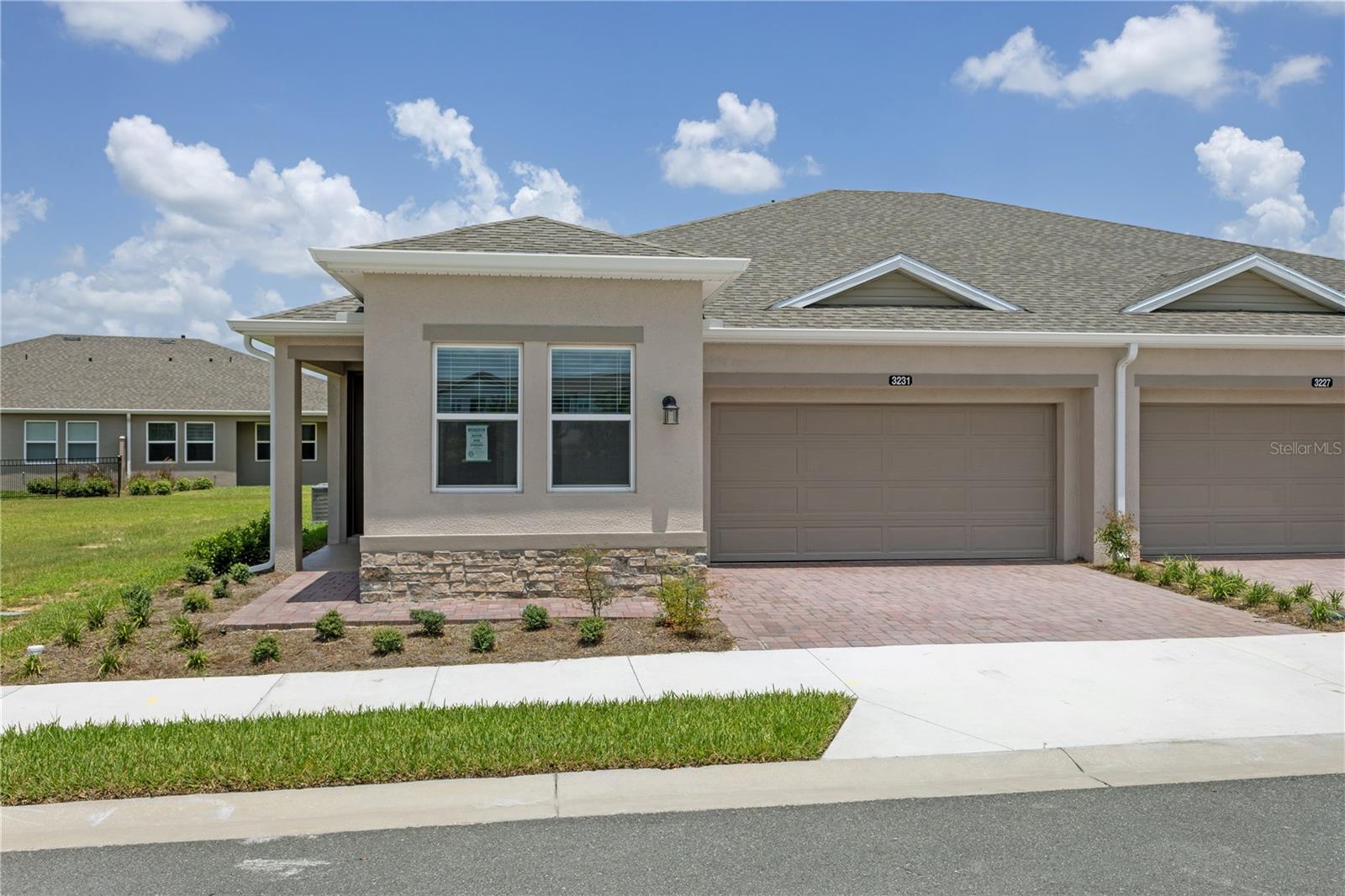 Welcome to the Evia model! This 2-bedroom, 2 bathroom open floor plan duplex is located in Ocala Preserve. The home features spacious bedrooms, tile flooring throughout, and a modern kitchen with stainless steel appliances. Enjoy countless amenities right outside your door! With pools, restaurants, walking paths, and fitness centers, every day feels like a vacation. You are just minutes away from the World Equestrian Center, shopping, dining, and so much more. Schedule your tour today.