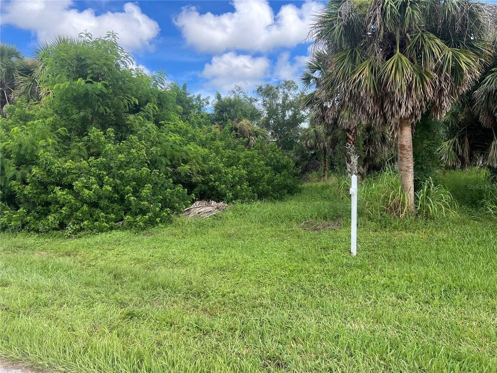 Photo of 128 Kings Dr, Rotonda West, FL 33947 (MLS # C7513192)