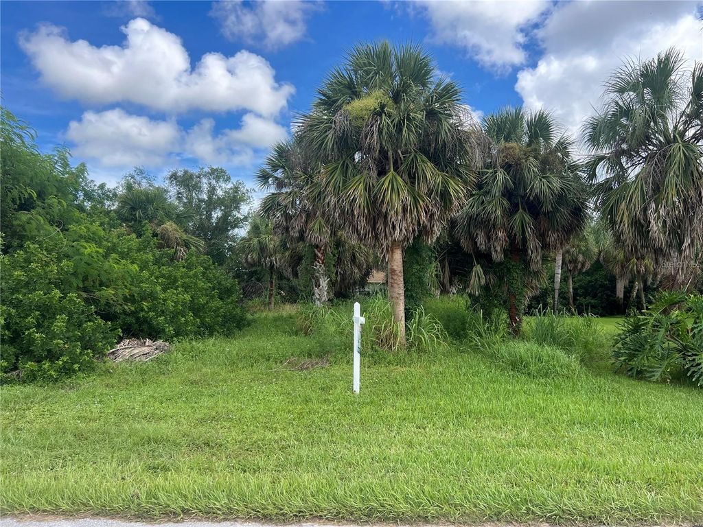 Photo of 128 Kings Dr, Rotonda West, FL 33947 (MLS # C7513192)