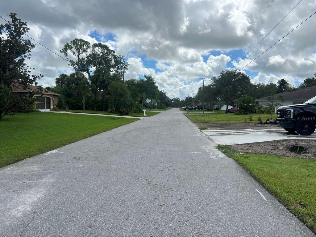 Photo of 128 Kings Dr, Rotonda West, FL 33947 (MLS # C7513192)