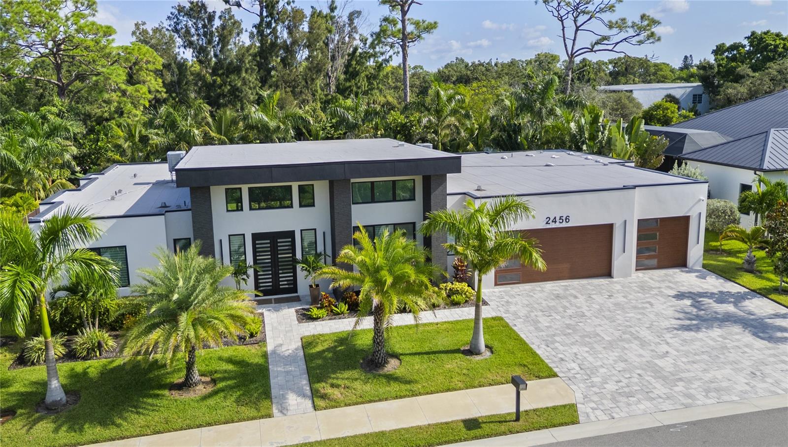 One or more photo(s) has been virtually staged. Welcome to 2456 Missara Lane in beautiful Sarasota, Florida. This stunning residence offers the perfect blend of coastal living and modern comfort. Nestled in a highly desirable neighborhood, the property features Phillippi Creek water access with a private boat dock, making it ideal for boating, fishing, or simply enjoying the serene waterfront lifestyle. Best of all, the home sits in a no flood zone, providing peace of mind for years to come. Inside, you’ll find custom details throughout, from thoughtfully designed living spaces to elegant finishes that set this home apart. The heart of the home is the gourmet kitchen, equipped with stainless steel appliances, custom cabinetry, and plenty of counter space for entertaining and cooking with ease. Located just a short walk to Riverview High School, the property combines everyday convenience with exceptional amenities. Whether you’re enjoying quiet evenings by the water, hosting gatherings in the open living areas, or taking your boat out for the day, this home truly has it all. Seller is offering 5% financing (Terms Apply)!!