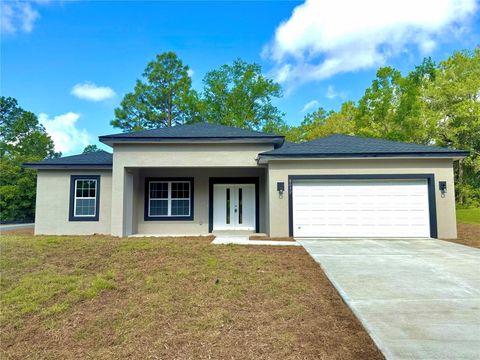 Photo of 8032 N Oberon Terrace, Dunnellon, FL 34434 (MLS # O6304447)