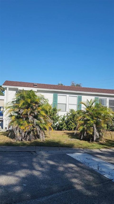 Photo of 9800 Oaks Street, Tampa, FL 33635 (MLS # OK225706)