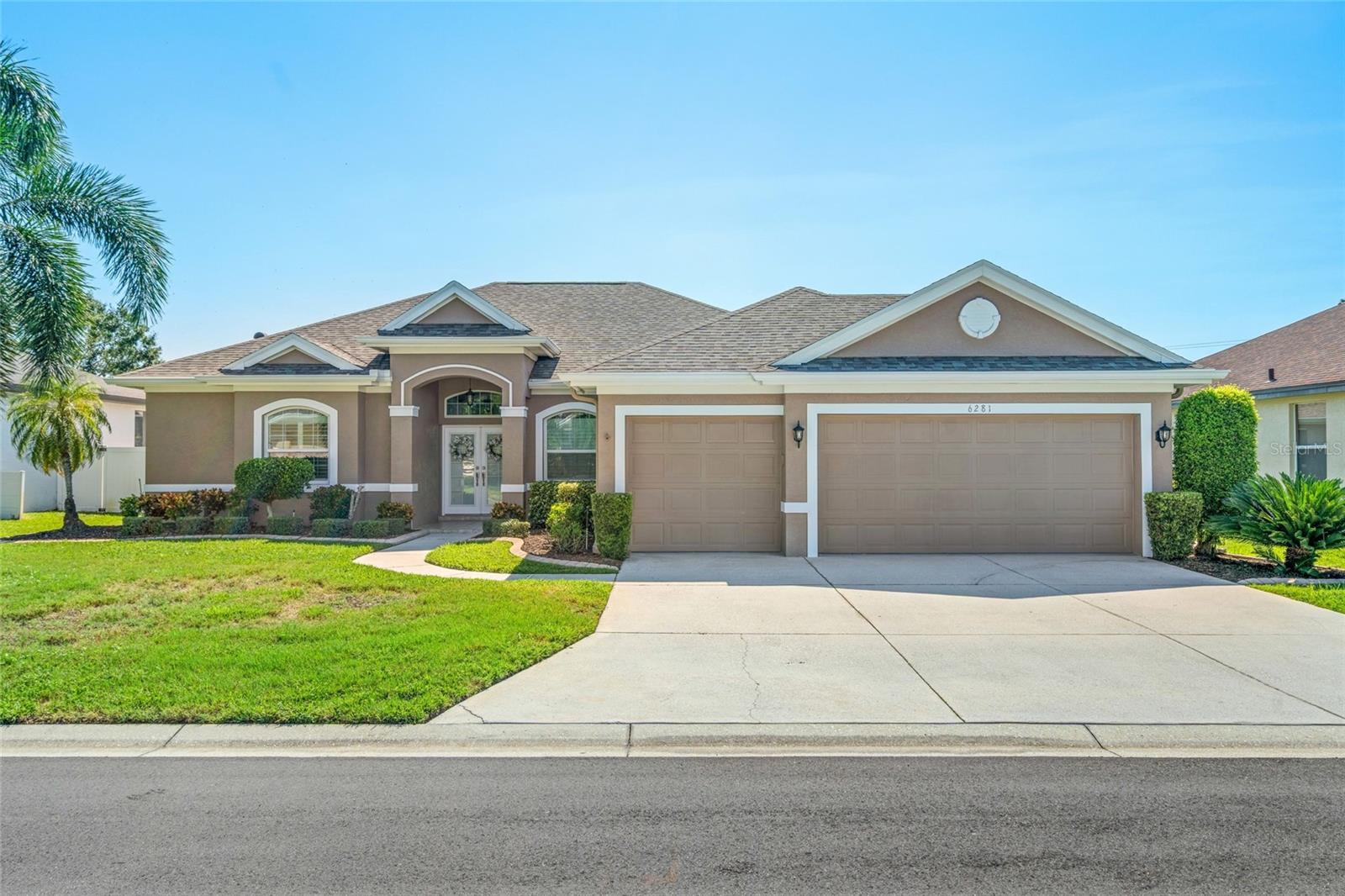 Welcome to your dream home in the desirable gated community of Eastlake! This beautifully maintained 4-bedroom, 3-car garage home offers the perfect blend of space, comfort, and natural beauty. From the moment you arrive, you'll be captivated by the stunning curb appeal, mature landscaping, and elegant front entry. Step inside to a bright, tiled foyer that opens to a spacious living and dining area filled with natural light—perfect for entertaining or relaxing with family. The gourmet kitchen features stainless steel appliances, wood cabinetry, and under/over cabinet lighting—all designed with both style and function in mind. Enjoy double tray ceilings with crown molding, and thoughtful touches throughout, including a laundry room with cabinets and utility sink. Step outside to your private lanai with covered awnings, offering a shaded retreat next to your sparkling pool with an auto-cleaner—all overlooking peaceful pastureland views. It’s the perfect setting to unwind and soak in the natural surroundings. Eastlake offers a tranquil, secure setting with easy access to parks, walking trails, shopping, dining, and entertainment. Located in a top-rated school district and just a short drive to Sarasota's world-renowned beaches, this home combines luxury living with a relaxed Florida lifestyle. This home is in pristine condition—truly move-in ready! Don’t miss your chance to make this exceptional home yours—schedule a private showing today!**This property qualifies for a 1-Point Lender paid, full term, rate buy down if using preferred lender. Inquire for more details.**