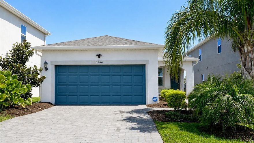 Tucked within the desirable Eaves Bend enclave of Artisan Lakes, this beautifully maintained residence offers a seamless blend of modern comfort and relaxed Florida living. Thoughtfully designed with an open-concept layout, this 3 bedroom, 2 bath home has elegant tile flooring, stone countertops, and inviting living spaces filled with natural light.

The spacious kitchen flows effortlessly into the main living and dining areas, creating an ideal setting for entertaining or quiet evenings at home. Sliding glass doors lead to a screened patio overlooking peaceful lake views and a fully fenced backyard - the perfect outdoor retreat for morning coffee or unwinding at the end of the day.

Residents of Artisan Lakes enjoy access to an impressive collection of resort-style amenities including a grand clubhouse, fitness center, pool, spa, basketball court, soccer field, playgrounds, dog parks and scenic walking trails.

Conveniently located near I-75, this home offers easy access to Tampa, St. Petersburg, Sarasota and the award winning beaches our area is known for. In a world that rarely slows down, this is the kind of home that invites you to breathe a little deeper and savor the moments that matter most.