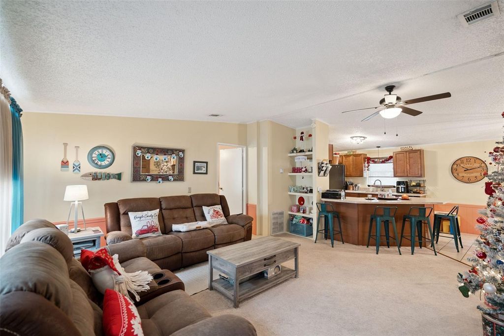 Photo of 50989 Highway 27 #48, Davenport, FL 33897 (MLS # O6364041)