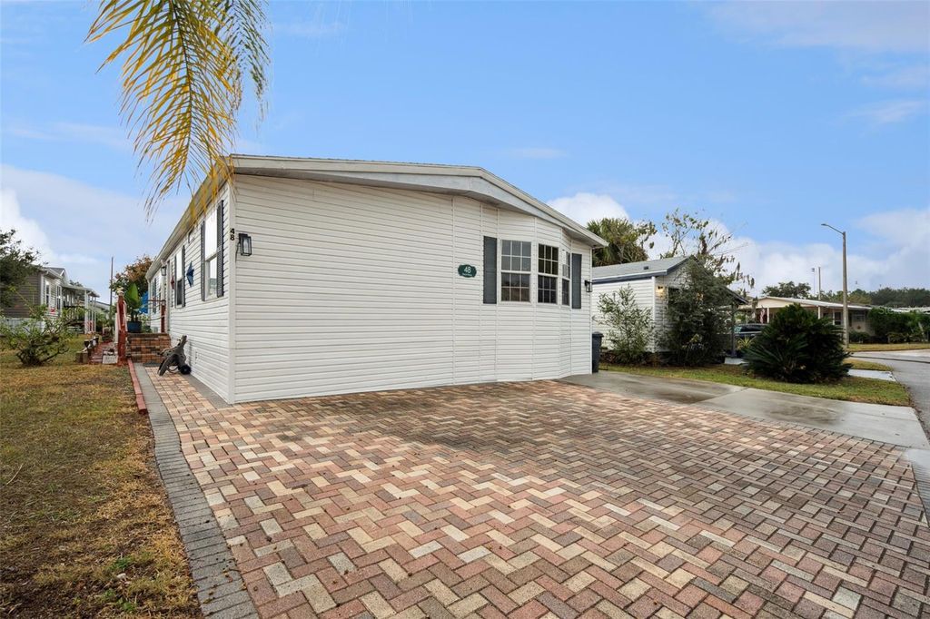 Photo of 50989 Highway 27 #48, Davenport, FL 33897 (MLS # O6364041)