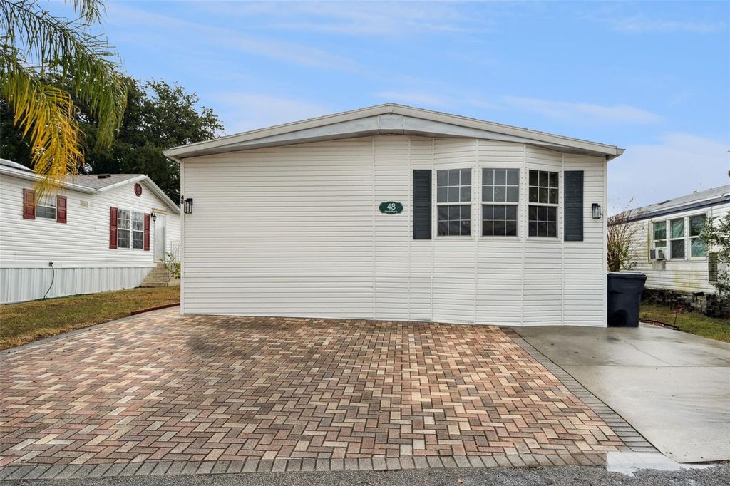 Photo of 50989 Highway 27 #48, Davenport, FL 33897 (MLS # O6364041)