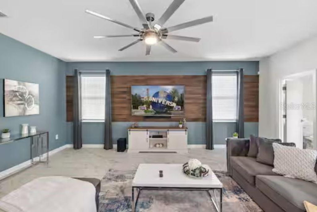 Photo of 913 Ocean Course Avenue, Davenport, FL 33896 (MLS # O6402821)