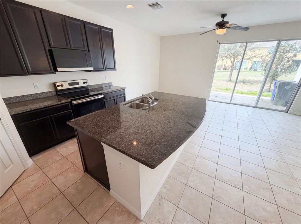 Photo of 7011 Towne Lake Road, Riverview, FL 33578 (MLS # O6391373)