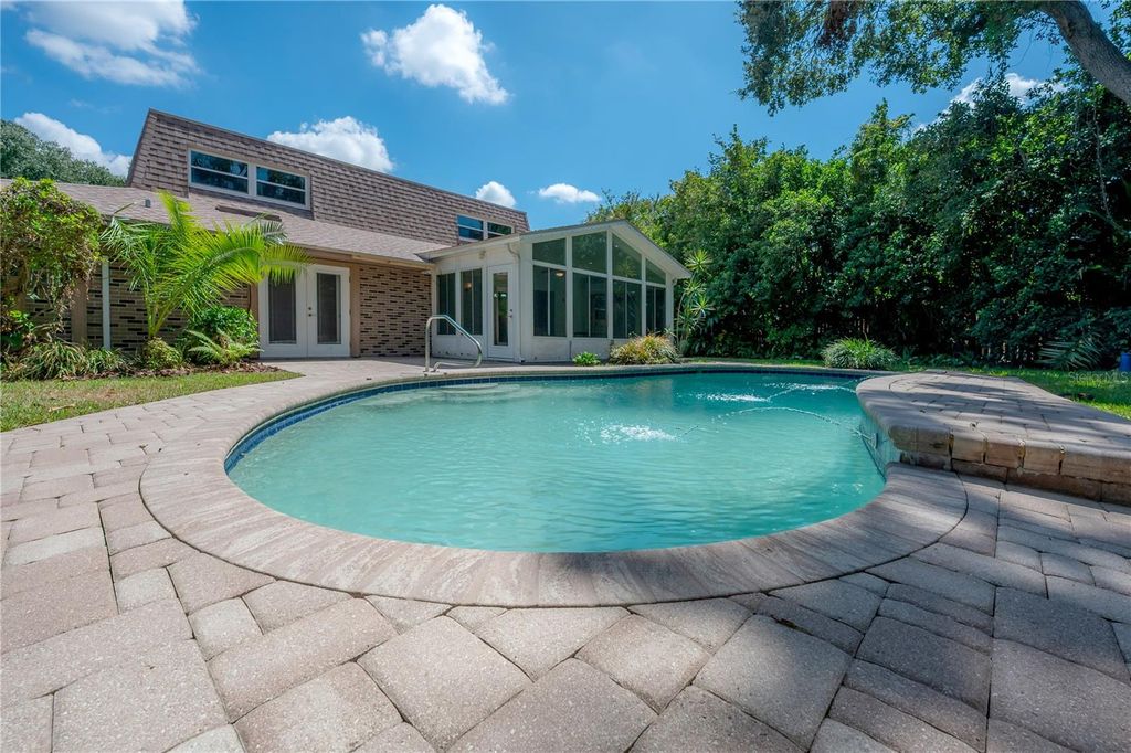 Photo of 13313 Golf Crest Circle, Tampa, FL 33618 (MLS # TB8420690)